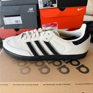 Adidas Black and Cream Athletic Shoes